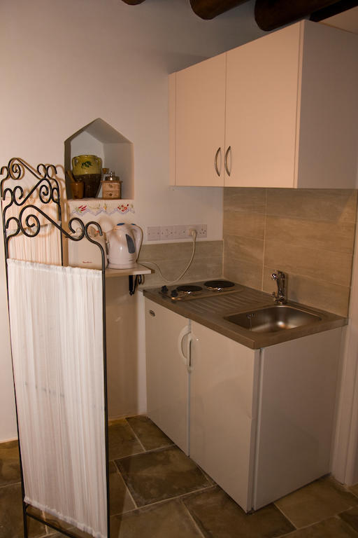 Xenios Cottages Lófu Szoba fotó